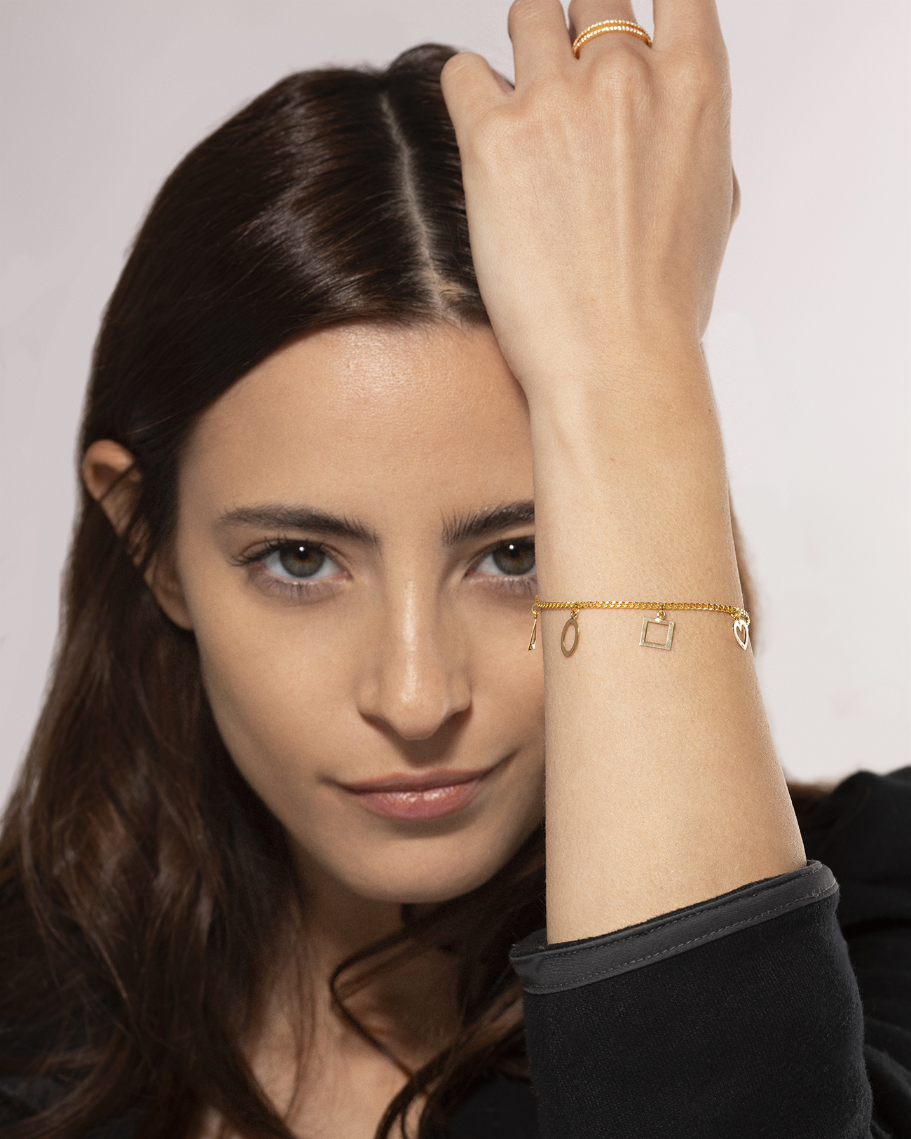 Model - 7 gold charms bracelet